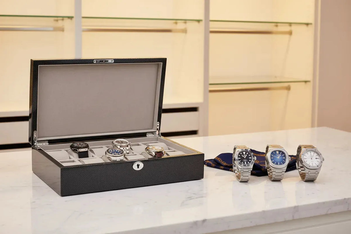 Aevitas 12 Watch Box Carbon Fibre with Rolex Submariner, Patek Philippe Nautilus and Audemars Piguet Royal Oak — best watch boxes USA 2026