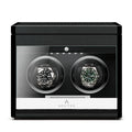 Aevitas 2 watch winder in carbon fibre finish with clear display and two rotating watches.