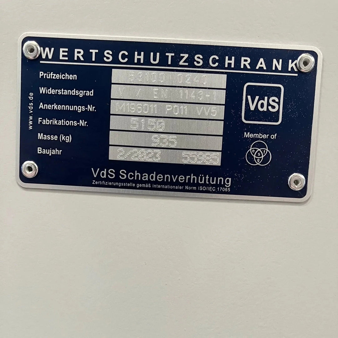 A metallic label on the Aevitas 12 Watch Winder Safe Grade 4 shows technical details in German, such as model number, weight, year, £600,000 Valuables Insurance Rating, and the VdS safety certification logo.