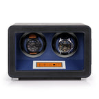 Aevitas 2-watch winder in black leather with blue interior, digital display, and two automatic watches on display.
