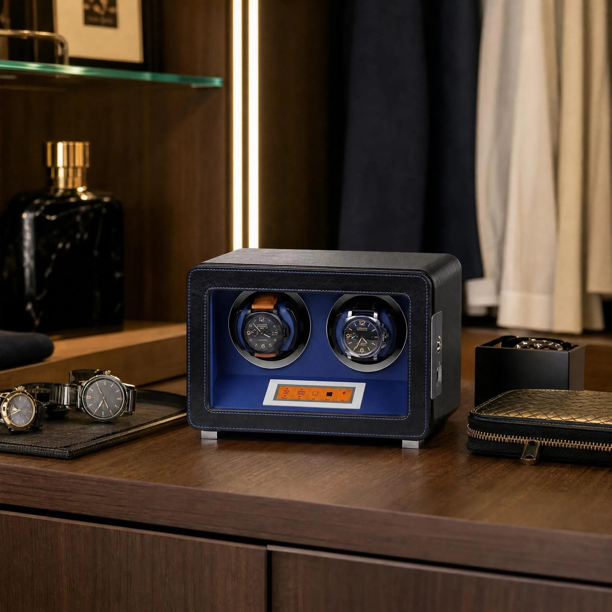 Aevitas 2-watch winder in black leather with blue interior, featuring digital controls and two automatic watches on display.