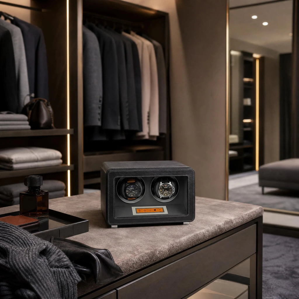 Full-body shot of a black and grey leather watch winder in a luxurious dressing room setting, emphasizing its size and sophisticated design.