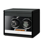 Aevitas 2 watch winder in carbon fibre finish with two watches and extra storage.