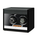 Aevitas 2 watch winder in carbon fibre finish with two watches and extra storage.