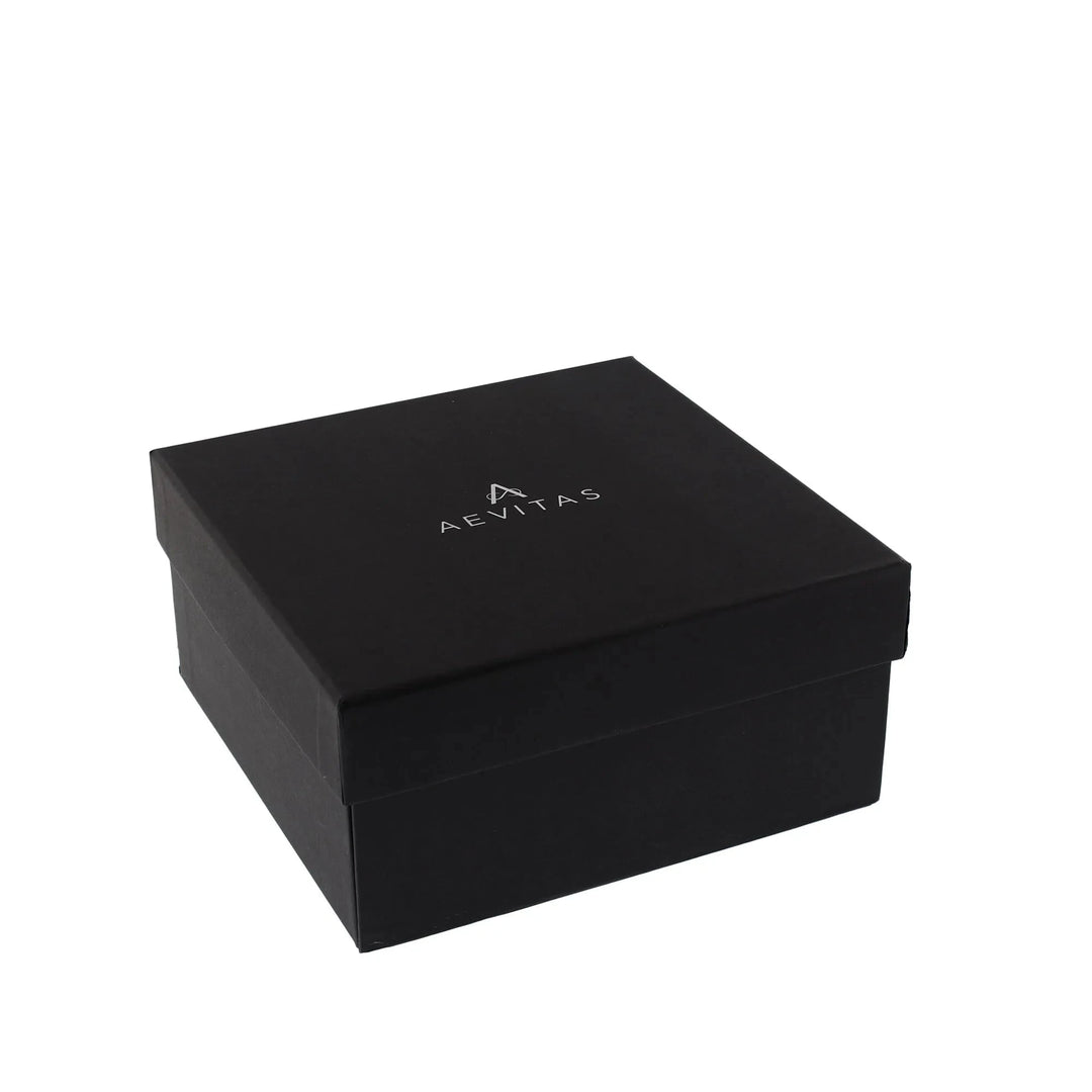 The 6 Watch Box in Luxurious Camphor Wood with Camel Lining by Aevitas features a sleek black design, fitted lid, and white AEVITAS branding on top—ideal as a stylish storage solution for any watch collection.