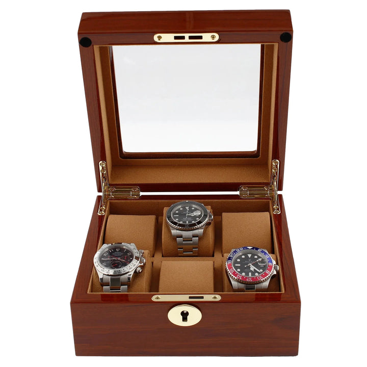 The Aevitas 6 Watch Box in luxurious mahogany wood features a glass lid, camel lining, gold hinge and lock, and displays up to six watches in separate compartments. Brand: Aevitas.