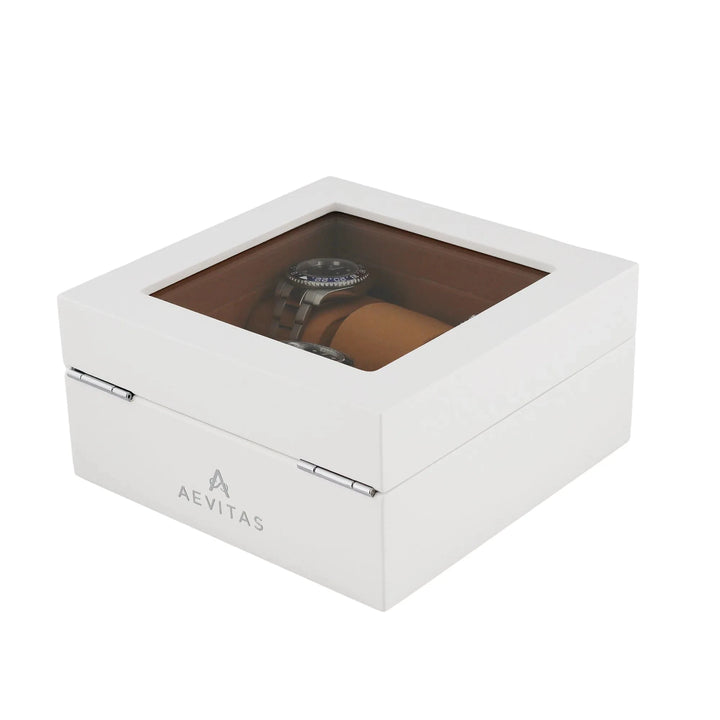 The Aevitas 6 Watch Box in luxurious white wood with camel lining features a glass top, elegantly displaying your watches inside.