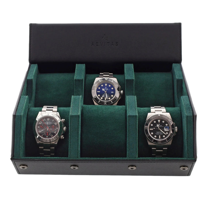 A black leather Aevitas Watch Winders 6 Watch Travel Case with green lining in a hexagon style is open, showing compartments for watches and the Aevitas brand on the inside lid.