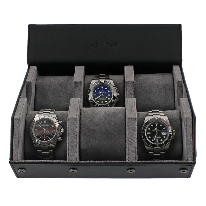 Aevitas Watch Winders’ 6 Watch Travel Case in Black Leather with Grey Lining (Hexagon Style) securely holds six watches in individual slots—an elegant, practical gift for watch enthusiasts.