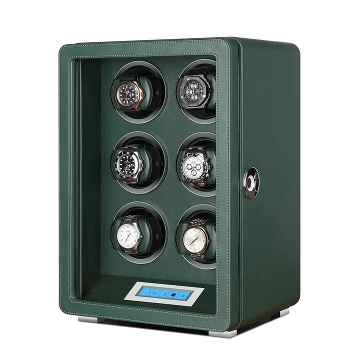 The Aevitas Automatic 6 Watch Winder in dark green smooth leather features an open front to display six watches and a digital control panel, keeping your automatic timepieces ready to wear in style.
