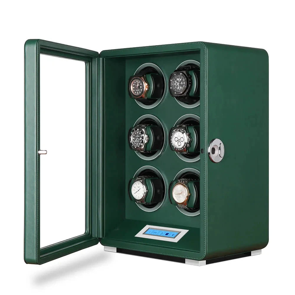 The Aevitas Automatic 6 Watch Winder in dark green smooth vegan leather features a transparent door, individual slots for six watches, silver knob, digital display, and control buttons on the front.