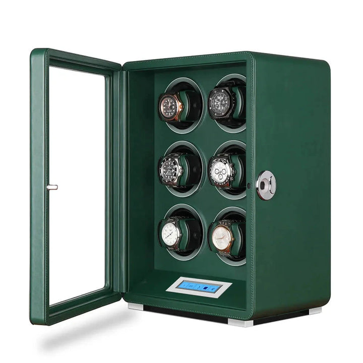 The Aevitas Automatic 6 Watch Winder in dark green smooth vegan leather features a transparent door, individual slots for six watches, silver knob, digital display, and control buttons on the front.