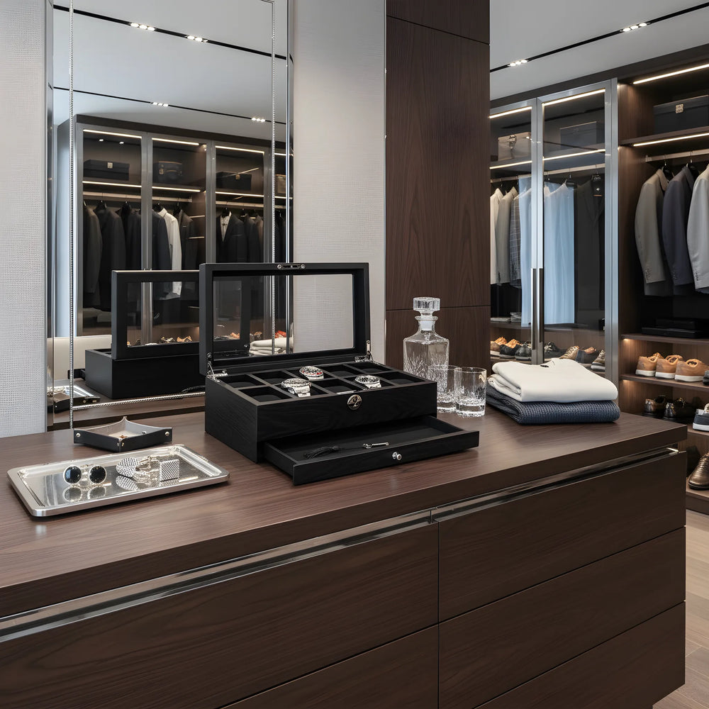 Modern closet with wooden dresser, open jewelry box, and neatly folded clothes.