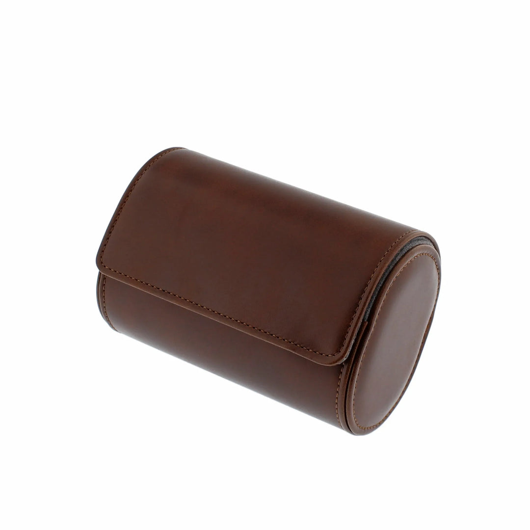 The Aevitas Premium Double Watch Roll features vintage brown vegan leather, a super soft grey suede lining, and a flap closure. Its cylindrical shape is shown in the product image on a white background.