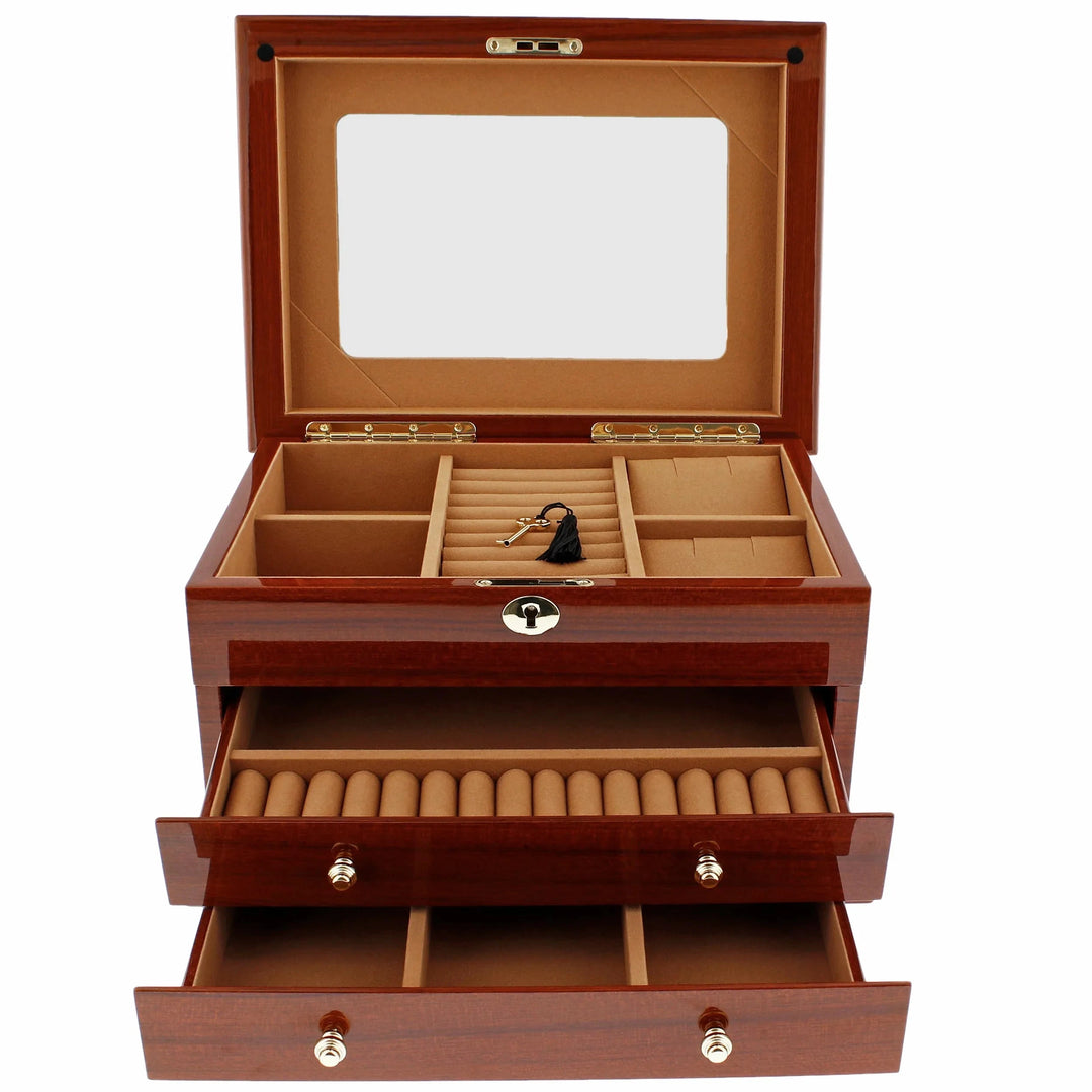 The Aevitas Premium Jewellery Box Extra Large Size in mahogany wood features a glass lid, lock and key, lower drawer with ring slots and sections, plus multiple compartments, all lined with camel-colour fabric for elegant storage.