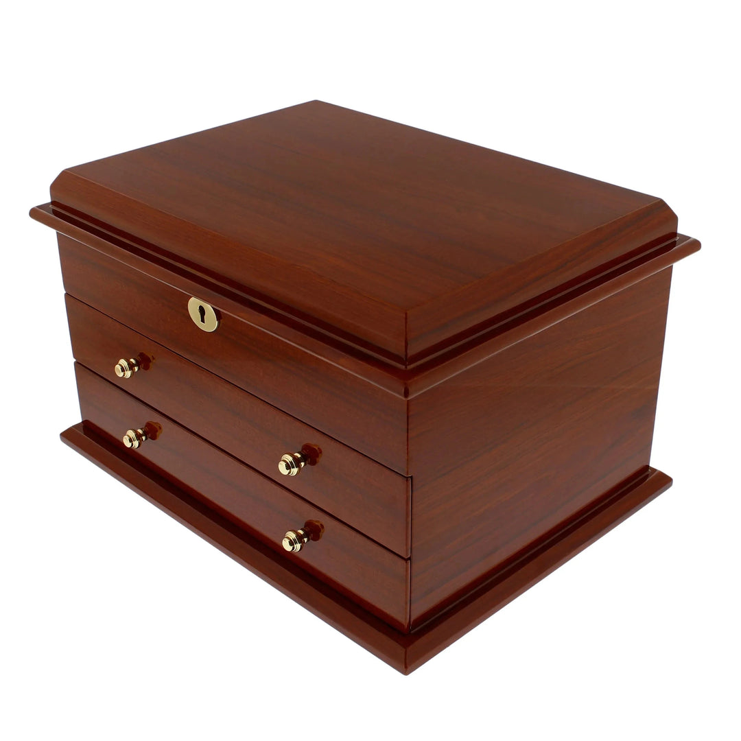 The Premium Jewellery Box Extra Large Size Mahogany Wood with Camel Colour Lining by Aevitas, from Aevitas Watch Winders, boasts a polished mahogany finish, hinged lid, two drawers, gold-colored knobs and keyhole, set against a white background.