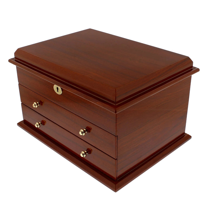 The Premium Jewellery Box Extra Large Size Mahogany Wood with Camel Colour Lining by Aevitas, from Aevitas Watch Winders, boasts a polished mahogany finish, hinged lid, two drawers, gold-colored knobs and keyhole, set against a white background.