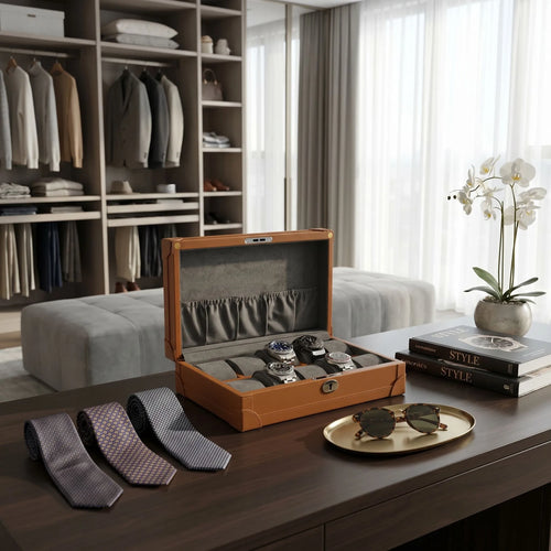 Realistic view of a 10 Watch Box in brown vegan leather with plush cushions, chrome fittings, and lock, displayed in a bright, modern walk-in dressing room.
